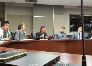 The delegation briefs an array of government officials at Global Affairs Canada.