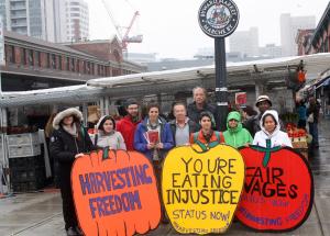 Inter Pares staff member Bill Fairbairn (front and centre) and caravan members leaflet at Ottawa's famed Byward Market.