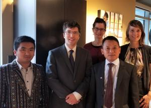 The delegation meets with MP Garnett Genuis (centre left).