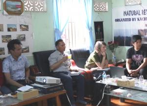 Samantha McGavin (second from right) and Bharat Bis hwakarma (centre), Inter Pares staff, with members of the Kachin Development Networking Group. Through community mobilizing, research, publication, and advocacy, Kachin Development Networking Group focuses on human rights abuses and environmental damage linked to natural resource megaprojects.