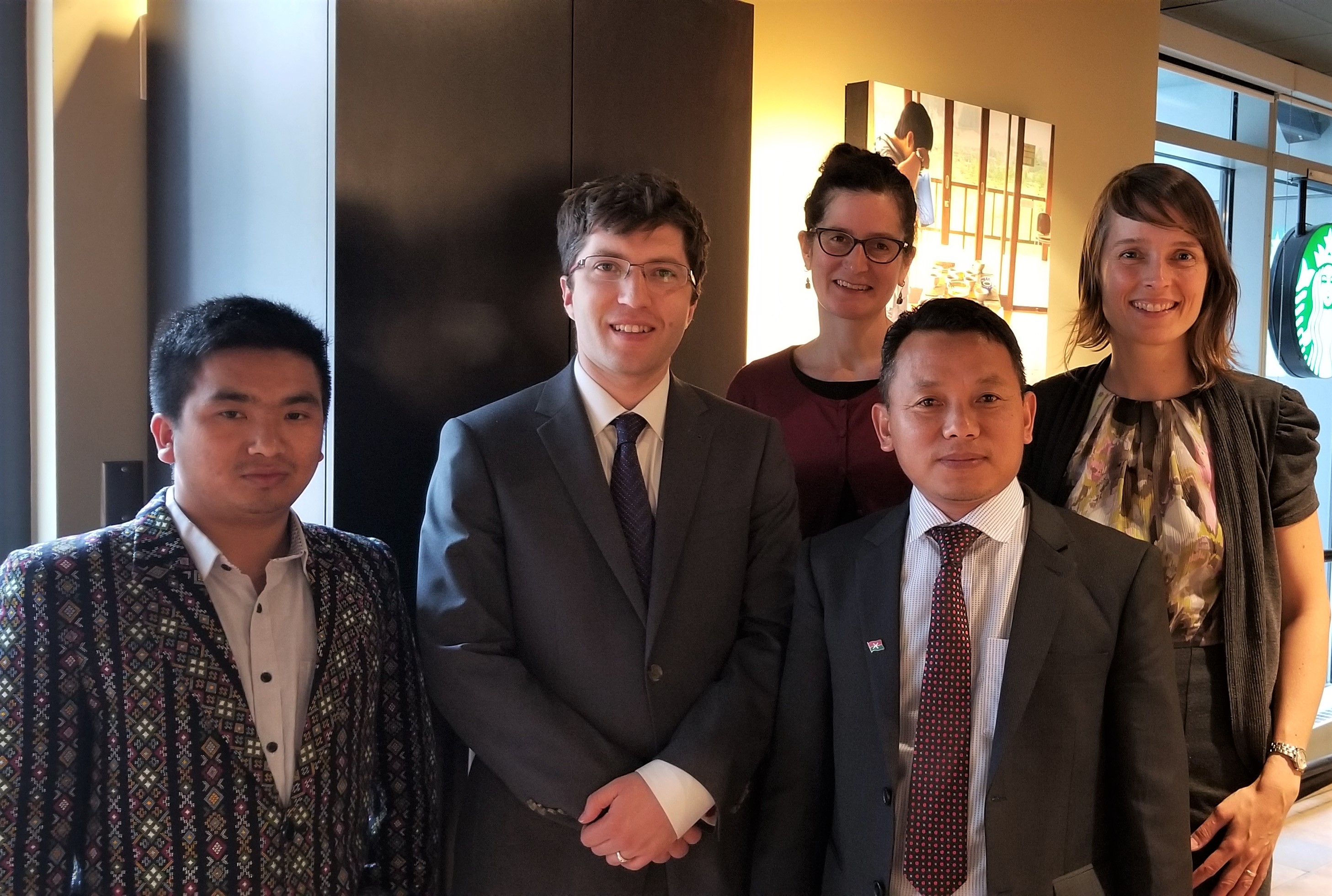 The delegation meets with MP Garnett Genuis (centre left). 
