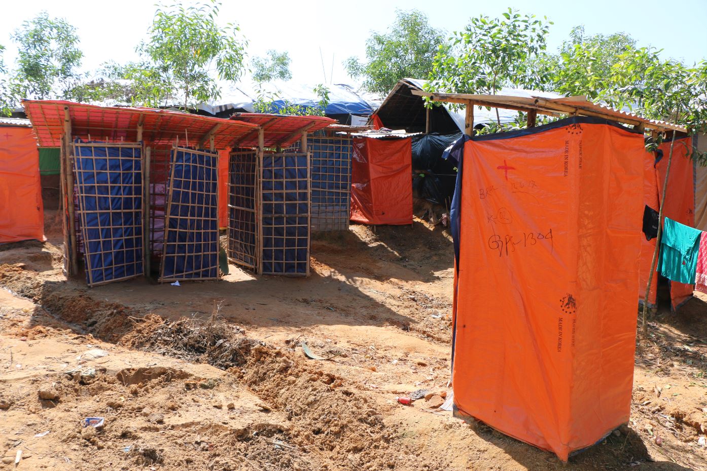 Kutupalong camp has many latrines, but their design requires water to keep them clear, and several had already backed up by the time of our visit.